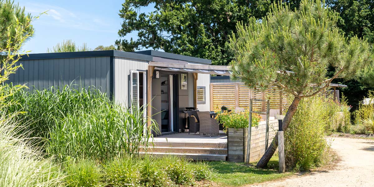 The designer terrace of a Taos Luxe mobile home for rent in southern Brittany