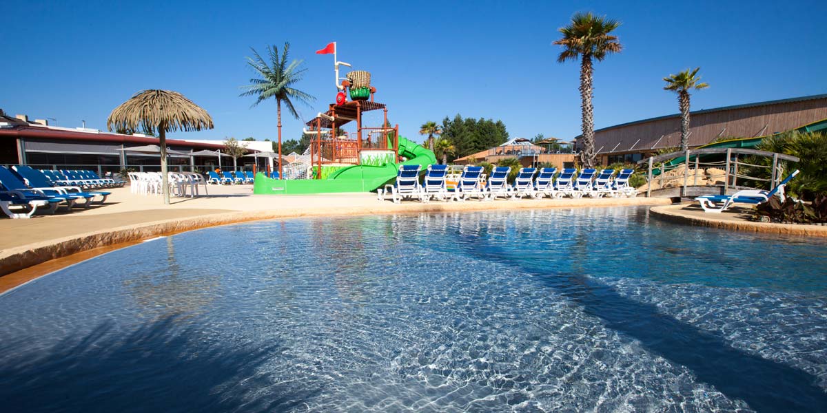 Outdoor pool and indoor pool at Le Fief campsite in southern Brittany