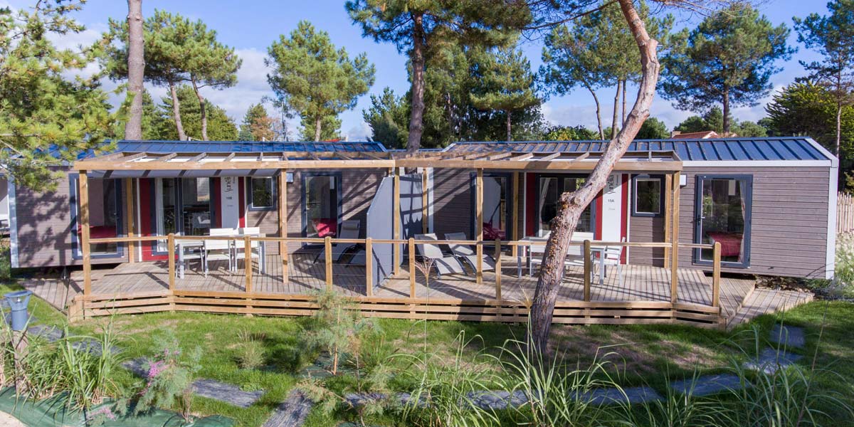 Terraces of the double Twin mobile home at Le Fief campsite in Loire-Atlantique